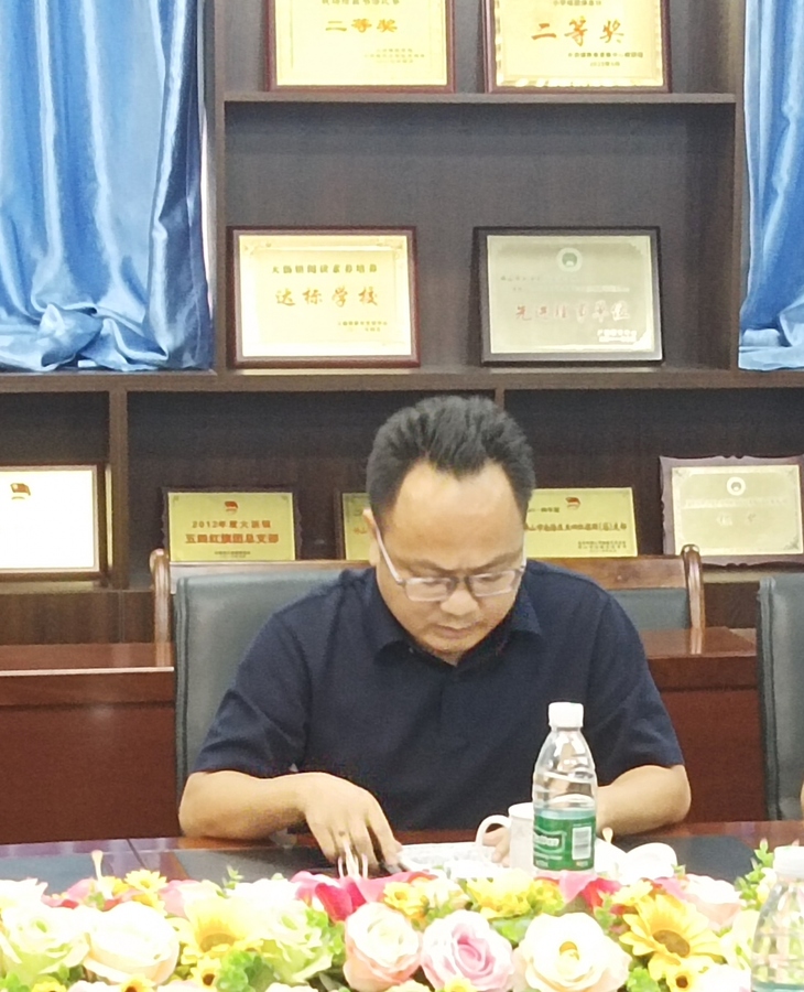 廖校.jpg